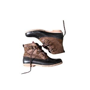Brown and black leather ankle duck style boots